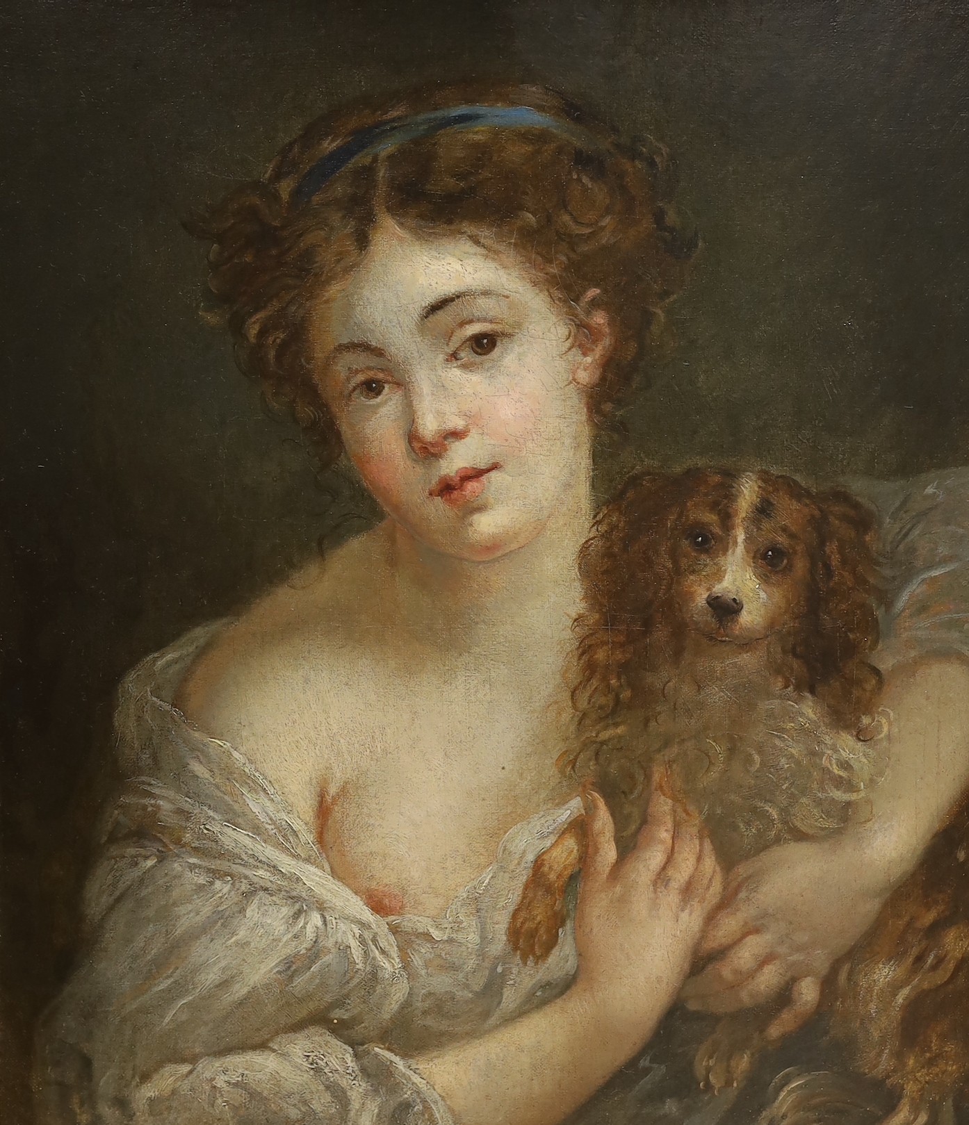 Follower of Jean-Baptiste Grueze (French, 1724/5-1805), oil on canvas, Portrait of a young woman with a spaniel, 52 x 44cm